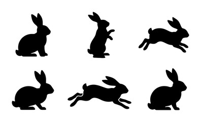 Obraz premium Six Black Rabbit Silhouettes, Dynamic Poses Vector Set, Cute Bunny Icons for Spring and Easter Graphics