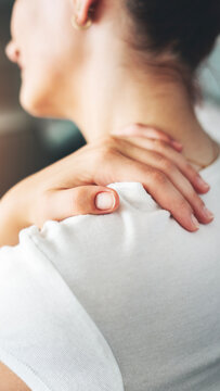 Young woman suffering from nape pain