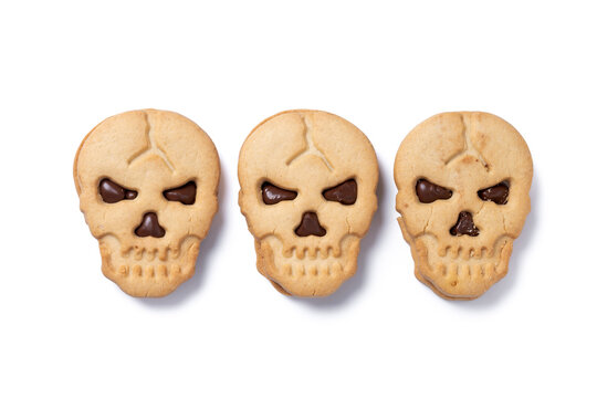 Halloween skull cookies with chocolate isolated on white background