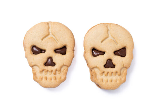 Halloween skull cookies with chocolate isolated on white background