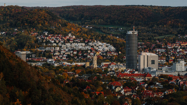 Close up aerial view of downtown Jena in autumn with prominent Jentower