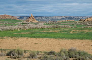 Castildetierra with visiting cars and vans, semi-desert Bardenas Reales, Spain © Witold Lapinski