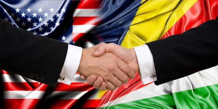 Handshake between the United States and Seychelles, international friendship, background with flags. Flags.