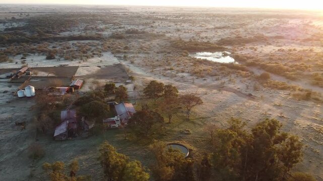 Severe frost and freezing temperatures over agricultural land and remote ranch in Argentina, aerial view