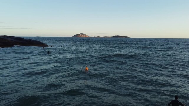 Surfer Riding Waves at Arpoador Beach, Rio de Janeiro, Brazil