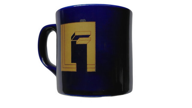 Dark blue ceramic coffee mug with a simple golden rectangular logo design on side isolated on transparent background