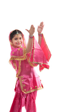 Sikh girl clapping her hands 