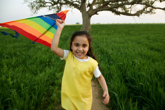 Portrait of a girl with a kite 