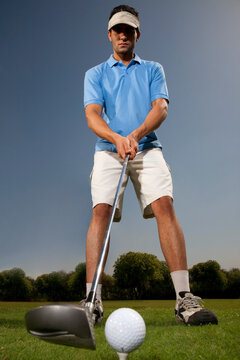 Man playing golf 