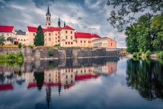 Dramatic summer view of Vyssi Brod Church and Monastery (Abtei Hohenfurth). Gloomy afternoon cityscape of Vyssi Brod, Czech Republic, Europe. Traveling concept background.
