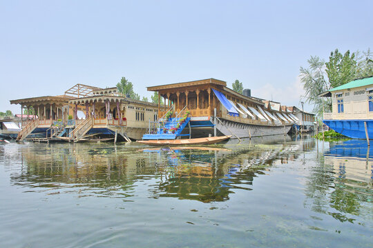 Kashmir with Dal freshwater lake in the city of Srinagar with Houseboats and shikaras on the lake, India