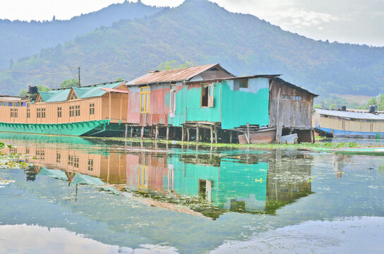 Kashmir with Dal freshwater lake in the city of Srinagar with Houseboats and shikaras on the lake, India