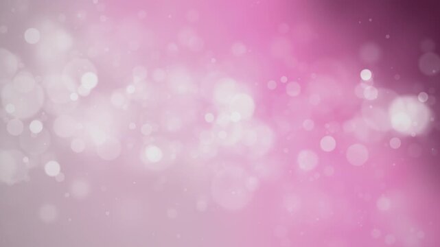 An abstract background of soft pink bokeh lights creating a gentle, dreamy, and luminous atmosphere.