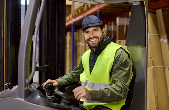 Forklift warehouse logistics worker operating equipment safely. Smiling operator navigates aisles and shelves, moving pallets for storage and fast delivery. Clear concept of efficient logistics.