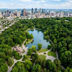 Fototapeta premium Aerial View of a Lush Green Park with a Pond and City Skyline in the Background