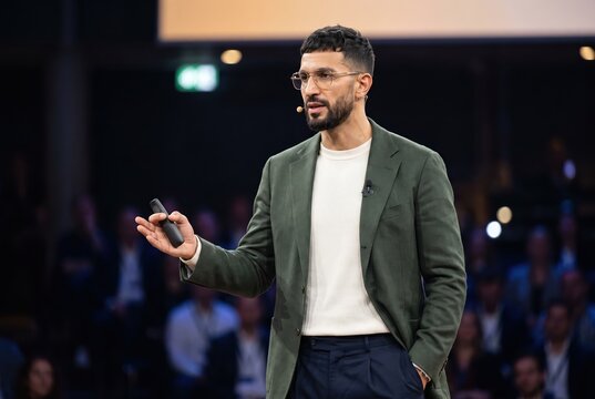 Generative AI, Male speaker presenting at a business conference