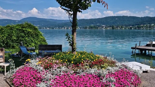 Lakefront Garden in Maria Worth Village Austria, Worthersee Lake on Sunny Summer Day