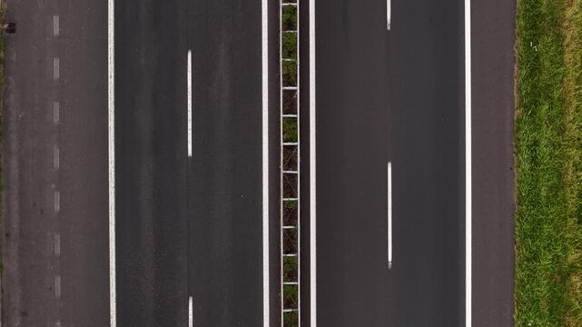 Busy Traffic on European Highway, Top Down Drone Shot of Cars and Trucks, High Angle Aerial View