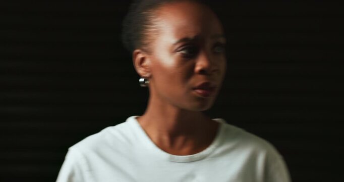 Confused, mental health and black woman in studio scared for trauma, emotional abuse and bipolar disorder. Psychology, danger and person with anxiety, depression and stress on dark background