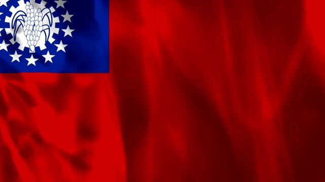 Waving flag of the Republic of the Union of Myanmar featuring silk texture and fabric folds