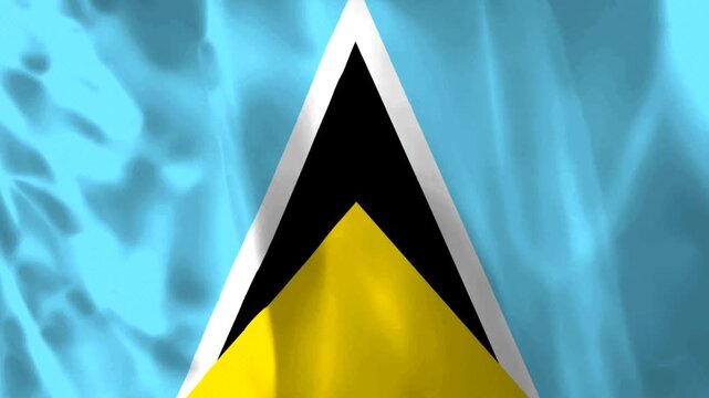 Waving flag of Saint Lucia featuring a blue field with a gold yellow triangle and black and white central shapes