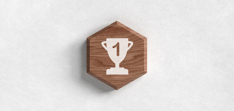 Wooden hexagonal block with carved first-place trophy icon on white background. Success symbol for business achievement, winner award, and gamification concept design.