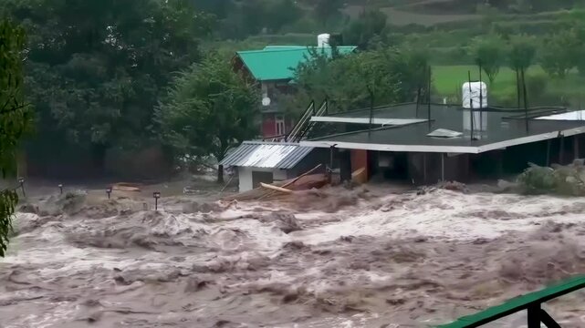 River flooding causing damage and destruction to a house. Effects of climate change.
