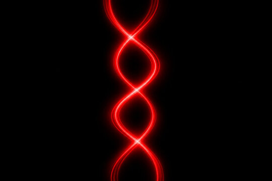 Abstract red glowing neon light trails forming a double helix dna structure on a black background