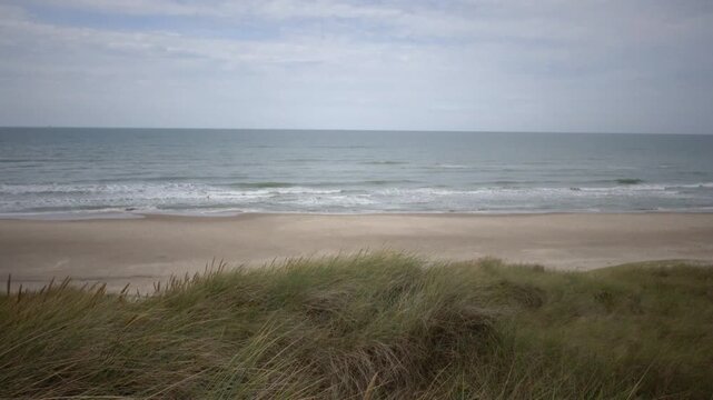 Hirtshals, Denmark A view of the North Sea on a windy day from a sand dune. 