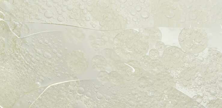 Abstract clear water bubbles essential oil beauty collagen Serum Repair cell background.	