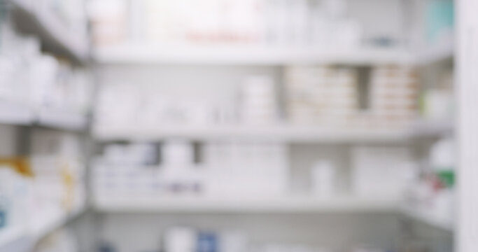 Medication, chemist and blur with shelves in dispensary for prescription healthcare treatment. Medical, pharmacy and empty pharmaceutical retail drugstore with medicine for stock inventory in clinic.