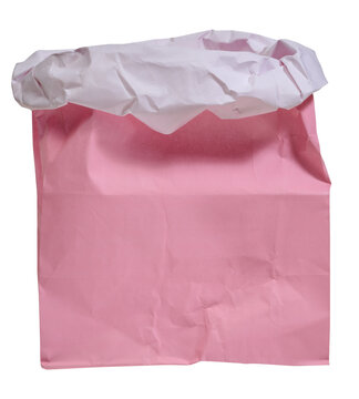 Crumpled pink paper bag with an open top, isolated background