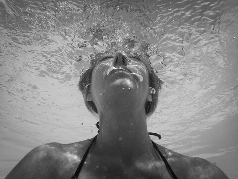 Underwater Black and White Portrait with Light Ripples