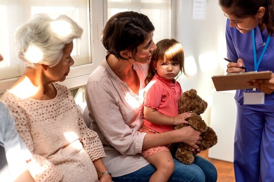 Family waiting at medical clinic.