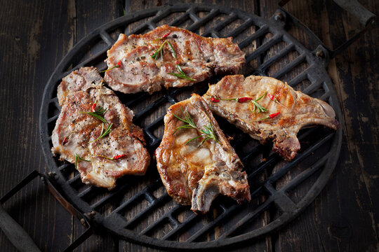 Pork collar cutlets on grill