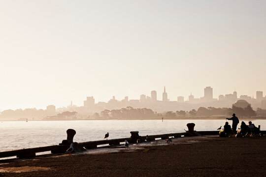 USA, California, San Francisco, Pier at dawn, skyline of San Francisco in background