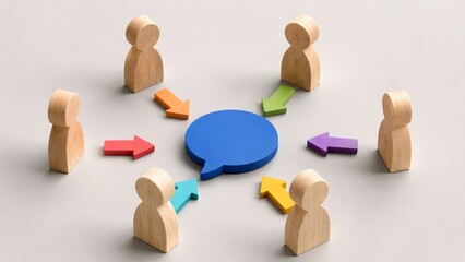Obraz premium Wooden figures with colorful arrows pointing to a central blue speech bubble. Concept of team collaboration, focused brainstorming, and corporate communication.