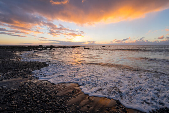 Spain, Canary Islands, La Gomera, Valle Gran Rey, evening at shingle beach