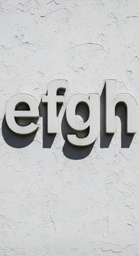 Shadow Play on Textured White: "efgh" Ascends