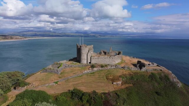Aerial Video of Criccieth castle Wales.The town is a seaside resort, popular with families.[3] Attractions include the ruins of Criccieth Castle, which have extensive views over the town 