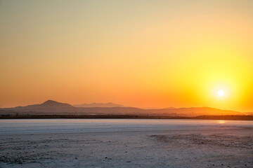 Obraz premium Golden Sunset at Larnaca Salt Lake in Cyprus