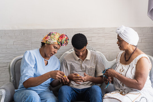 Multigenerational afro-brazilian family sharing cultural traditions and wisdom