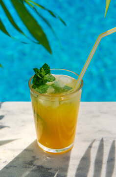 Cocktail in the pool. Selective focus.