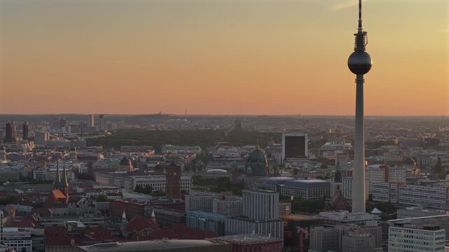 Alexanderplatz TV Tower Close Up View, Fernsehturm at Sunset Time in Berlin City Center, Aerial Parallax Drone Shot.