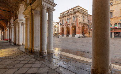 Fototapeta premium Vicenza - The Piazza dei Signori square at dusk and Loggia del Capitaniato.