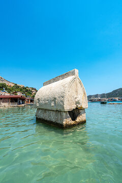 Turquoise waters and ancient Lycian coast of Kekova Island during a boat cruise in Antalya, Turkey.