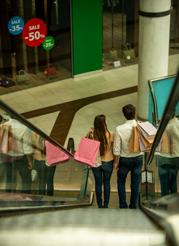 Escalator Shopping Couple.