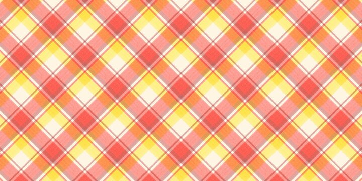 Seamless vibrant diagonal plaid pattern in orange, red and yellow for background design. Classic argyle pattern design. Diamond pattern background.