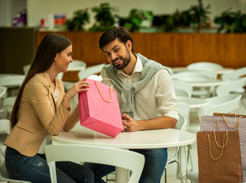 Couple Sharing Shopping Purchase.