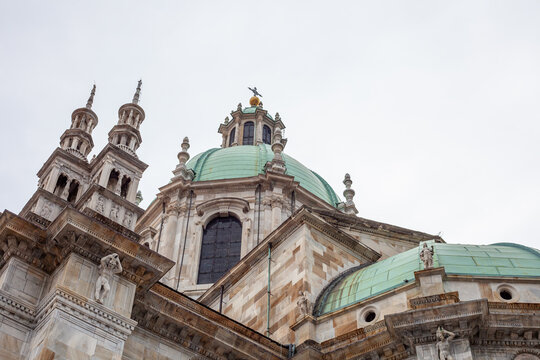 Old Church in Italy Como Cathedral Duomo Italian old temple in center. Santa Maria Assunta square. Como city center house building architecture. Street wall facade.